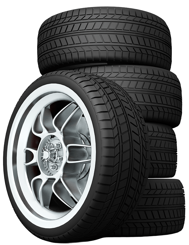 Gestapelte Autoreifen mit silbernen Felgen